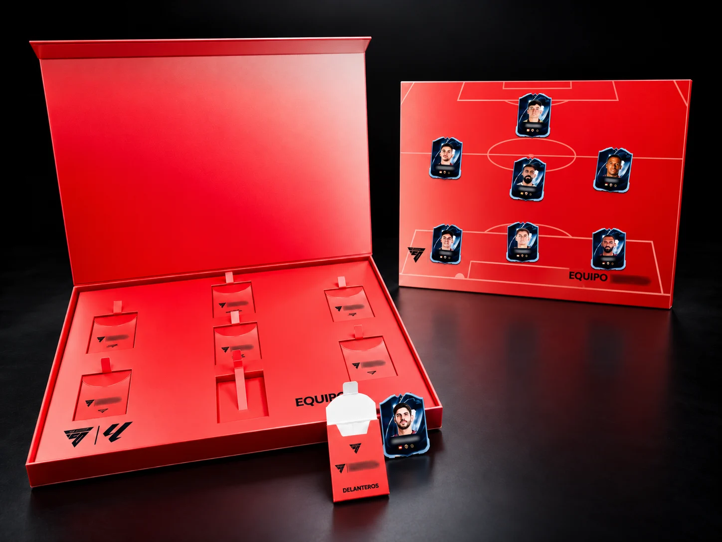 Caja roja abierta con fichas de EA Sports FC